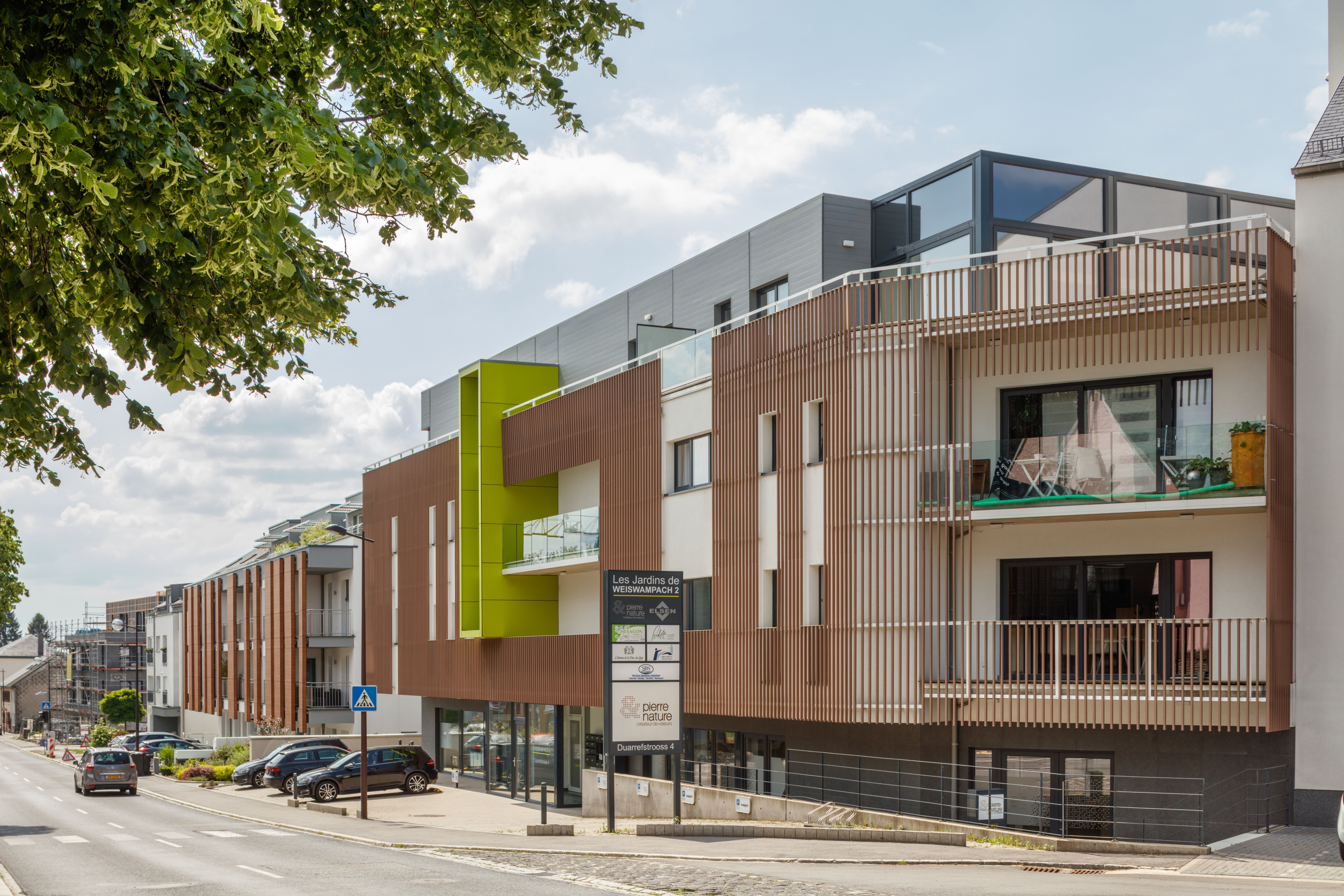 Wohngebäude_Offene Fassadenverkleidung - verti._Wohnhaus